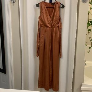 Lulu’s XS Burnt orange wide leg jumpsuit with bow - tie in front or back